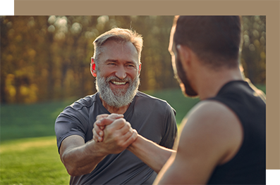 Two men exercising in a park