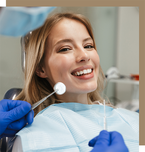 Young woman smiling at her dental checkup