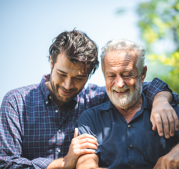 Man and his elderly father walking outdoors